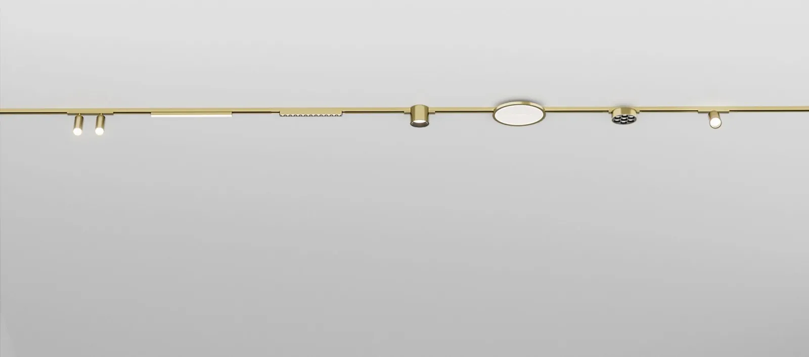 A surface-mounted Mini.12 track run fitted with several lighting modules