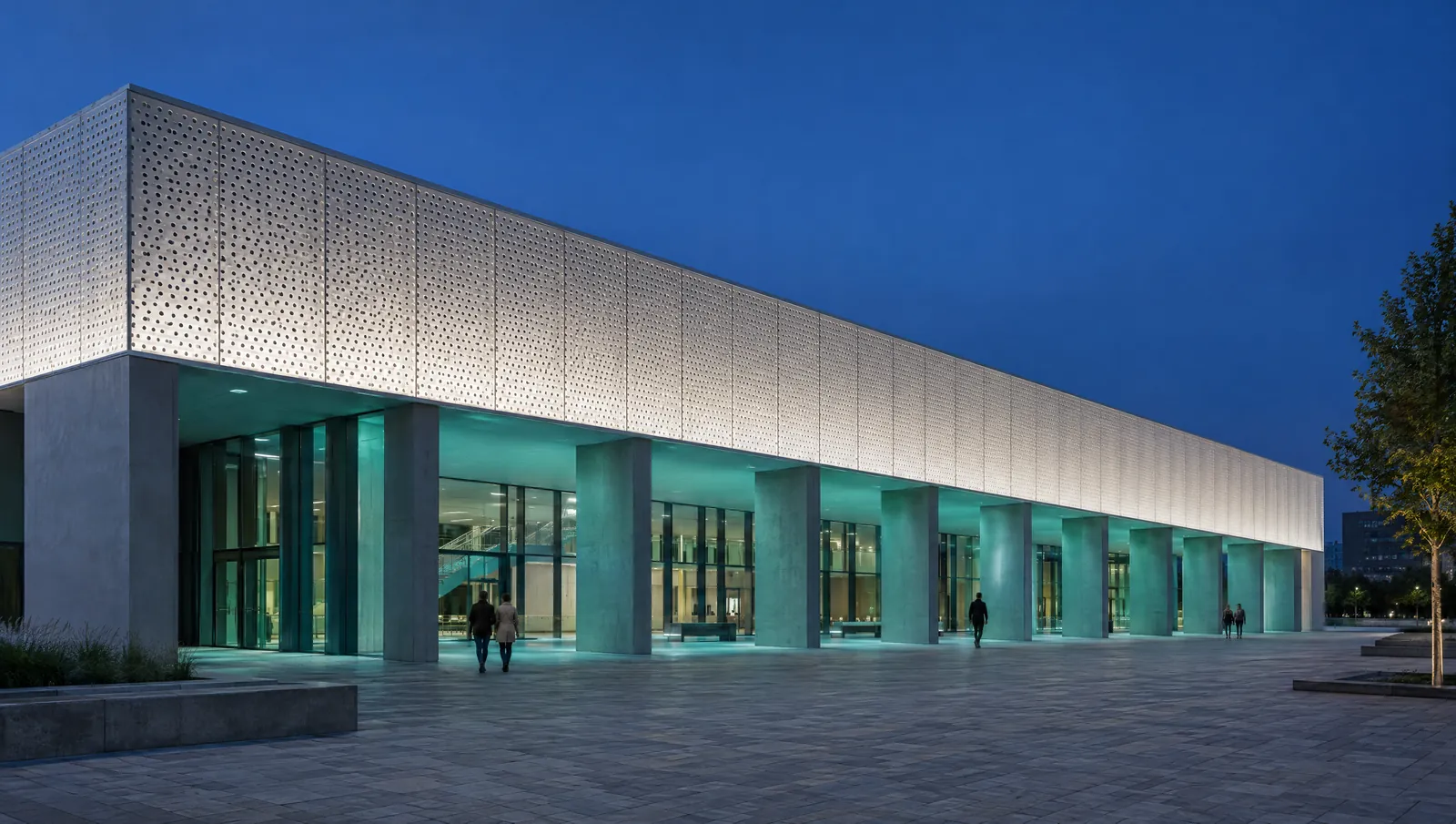 Cultural building at dusk in one static scene: perforated upper panels in neutral white and the colonnade below in soft teal