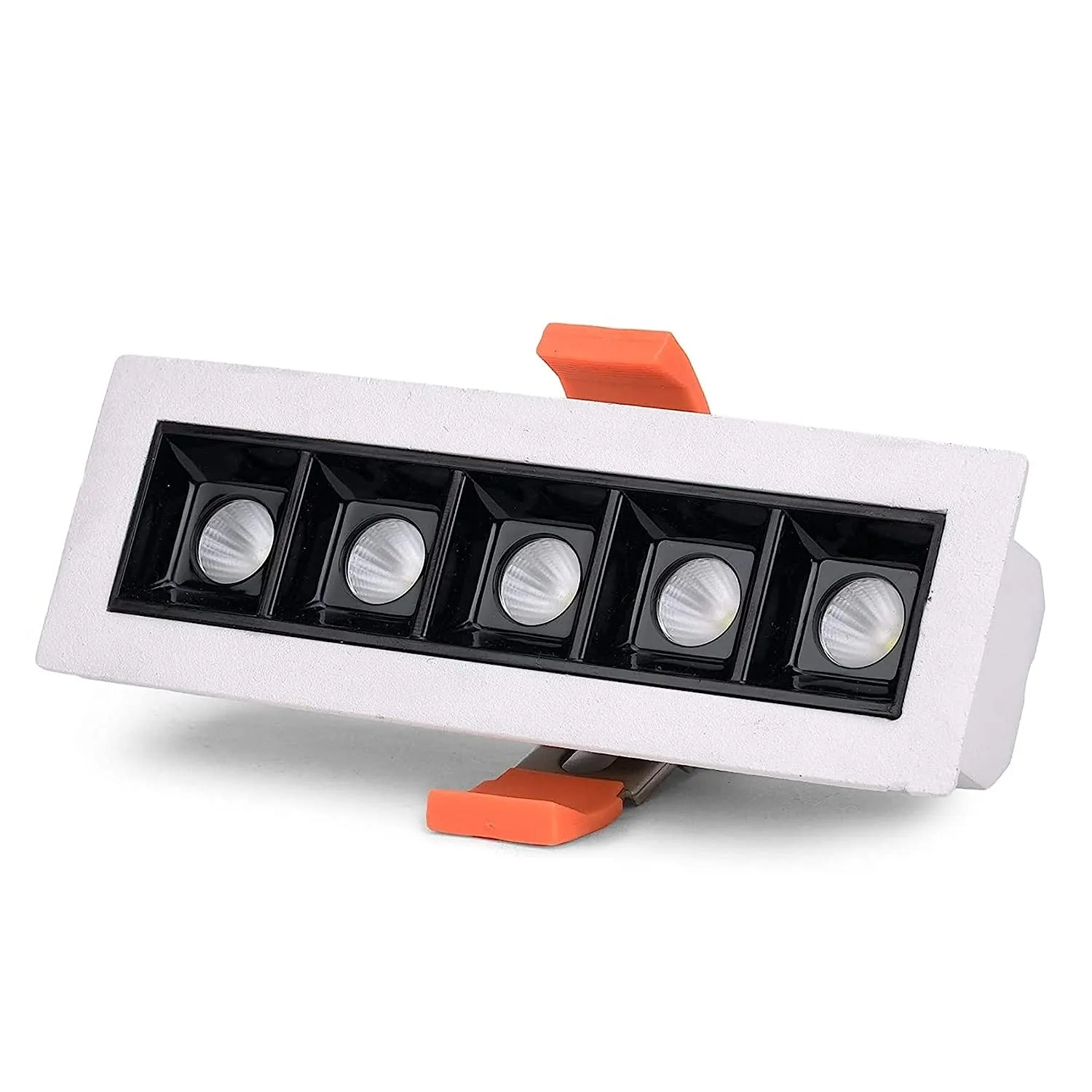 Bling recessed linear spotlight: a row of small cells in a white trim